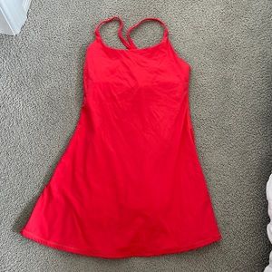 Red tennis dress. Built in bra/shorts.